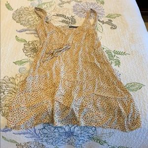 Yellow dress with red flowers